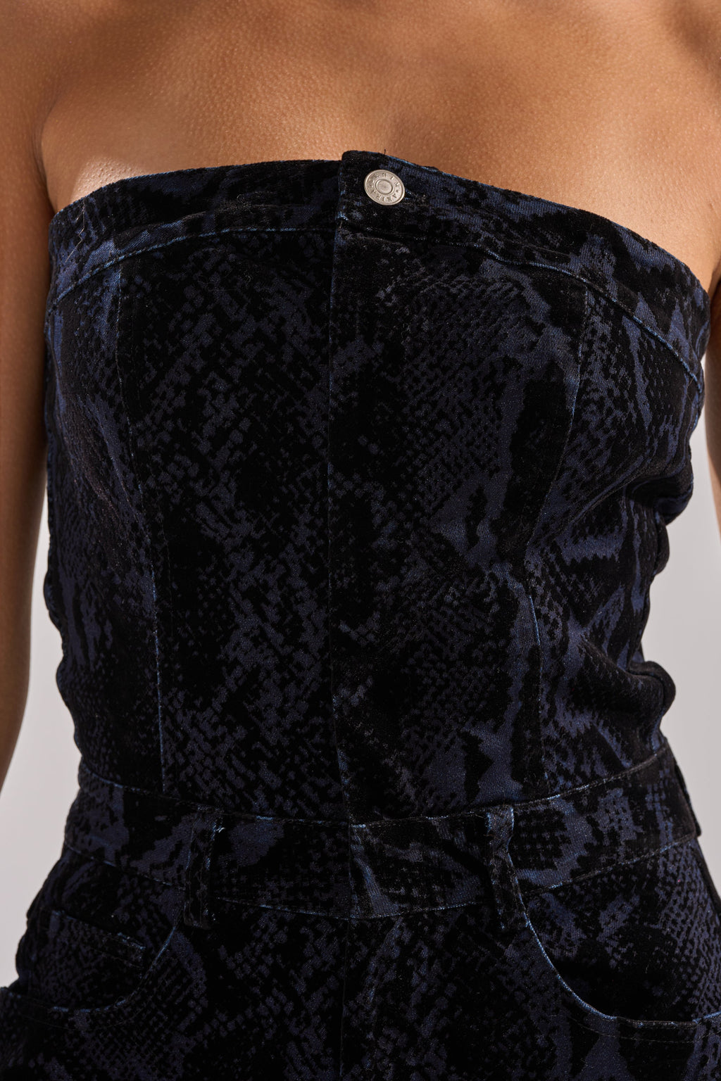 CAUGHT YOUR EYE VELVET DENIM JUMPSUIT IN SNAKEPRINT